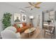 Cozy living room featuring an orange couch and a coffee table at 2707 W Leroy St, Tampa, FL 33607