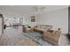 Covered patio with seating area and dining set at 2707 W Leroy St, Tampa, FL 33607
