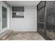 Side yard patio with pavers and access door at 2707 W Leroy St, Tampa, FL 33607