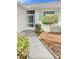 Walkway leading to the front door of the house at 761 Tremont Greens Ln # 61, Sun City Center, FL 33573