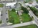 Aerial view showing a property near commercial buildings and roads at 11348 Pine St, Riverview, FL 33578