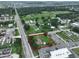 Aerial view highlighting property location near main road and commercial area at 11348 Pine St, Riverview, FL 33578