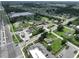 Aerial view showing property near intersection, gas station, and storage facility at 11348 Pine St, Riverview, FL 33578