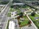 Aerial view of property with bordering commercial spaces at 11348 Pine St, Riverview, FL 33578