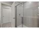 Clean bathroom with a tiled shower and glass enclosure at 5624 Brooklet Woods Dr, Wesley Chapel, FL 33545