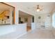 Sunroom with view to kitchen and living room at 4961 Grist Mill Cir, New Port Richey, FL 34655