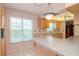 Bright kitchen with ample counter space and wood cabinets at 4961 Grist Mill Cir, New Port Richey, FL 34655