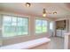 Bright laundry room with washer, dryer, and extra storage at 4961 Grist Mill Cir, New Port Richey, FL 34655