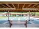 Covered bocce ball courts with benches and landscaping at 4961 Grist Mill Cir, New Port Richey, FL 34655