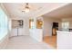 Laundry room features washer, dryer, and access to other areas at 4961 Grist Mill Cir, New Port Richey, FL 34655