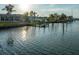 Scenic canal view showcasing waterfront homes and boats at 729 Spanish Main Dr, Apollo Beach, FL 33572