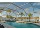 Relaxing screened pool area with water views at 729 Spanish Main Dr, Apollo Beach, FL 33572