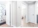 Clean hallway with doors to bedrooms and bathroom at 2102 E Annie St, Tampa, FL 33612
