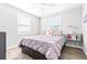 Spacious bedroom with large bed, window and nightstand at 2102 E Annie St, Tampa, FL 33612