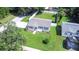 House with a gray roof and green lawn, viewed from above at 2102 E Annie St, Tampa, FL 33612