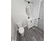 Modern bathroom with vanity, toilet and gray flooring at 3001 E 25Th Ave, Tampa, FL 33605