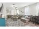 Spacious living room with a comfortable sectional sofa and stylish decor at 6357 Shore Vista Pl, Apollo Beach, FL 33572