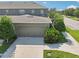 Private one-car garage with driveway at 6357 Shore Vista Pl, Apollo Beach, FL 33572
