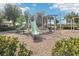 playground with slides and climbing structures at 6357 Shore Vista Pl, Apollo Beach, FL 33572