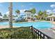Relaxing pool area with waterslide at 6357 Shore Vista Pl, Apollo Beach, FL 33572