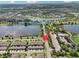 Aerial view showcasing community amenities and lake at 6357 Shore Vista Pl, Apollo Beach, FL 33572