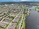 Aerial view of community near a lake at 6357 Shore Vista Pl, Apollo Beach, FL 33572