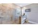 Bathroom with a walk-in shower and a separate soaking tub at 18014 Tavernside Trl, Lakewood Ranch, FL 34211