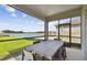 Relaxing screened patio overlooking a lake at 9210 Ballaster Pointe Loop, Parrish, FL 34219