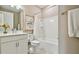 Clean bathroom with a tub shower combo and updated vanity at 9210 Ballaster Pointe Loop, Parrish, FL 34219