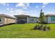 Landscaped backyard with spacious patio and great view at 9210 Ballaster Pointe Loop, Parrish, FL 34219