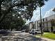 Community view, ample parking, and mature trees at 811 Russell Ln # 309, Brandon, FL 33510