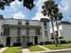 Condo building with stairs and landscaping at 811 Russell Ln # 309, Brandon, FL 33510
