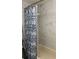 Clean bathroom with marble-look tile and shower/tub combo at 811 Russell Ln # 309, Brandon, FL 33510