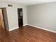 Bedroom with wood-look floors and neutral wall colors at 811 Russell Ln # 309, Brandon, FL 33510