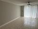 Spacious living area with tile floors and large windows at 811 Russell Ln # 309, Brandon, FL 33510