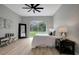 Main bedroom with sliding door to backyard at 3410 E Henry Ave, Tampa, FL 33610