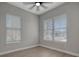 Bright office with neutral walls and hardwood floors at 3410 E Henry Ave, Tampa, FL 33610