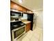 Modern kitchen with stainless steel appliances and granite countertops at 7156 E Bank Dr # 7156, Tampa, FL 33617