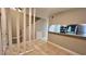 Bright entryway with staircase and view of kitchen at 7156 E Bank Dr # 7156, Tampa, FL 33617