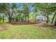 Community playground nestled amongst mature trees at 7156 E Bank Dr # 7156, Tampa, FL 33617