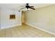 Living room with tile flooring and ceiling fan at 7156 E Bank Dr # 7156, Tampa, FL 33617
