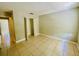 Spacious bedroom with tile flooring and a large closet at 7156 E Bank Dr # 7156, Tampa, FL 33617