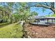 Home with private canal access and lush landscaping at 7156 E Bank Dr # 7156, Tampa, FL 33617
