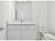 Small bathroom with toilet and vanity at 3008 Forest Meadow Ave, Valrico, FL 33594