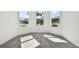 Bright bedroom with bay window and grey carpet at 3008 Forest Meadow Ave, Valrico, FL 33594