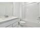 Bathroom with white vanity, tub, and subway tile at 3008 Forest Meadow Ave, Valrico, FL 33594