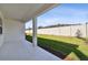 Covered patio overlooks fenced backyard at 3008 Forest Meadow Ave, Valrico, FL 33594