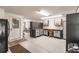 Organized garage space with ample storage cabinets and workbench at 210 Lakeview Dr, Anna Maria, FL 34216