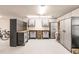 Spacious garage with cabinets, workbench, and ample storage at 210 Lakeview Dr, Anna Maria, FL 34216