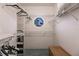 Bright walk-in closet with shelving and closet rods, stained glass window feature at 210 Lakeview Dr, Anna Maria, FL 34216